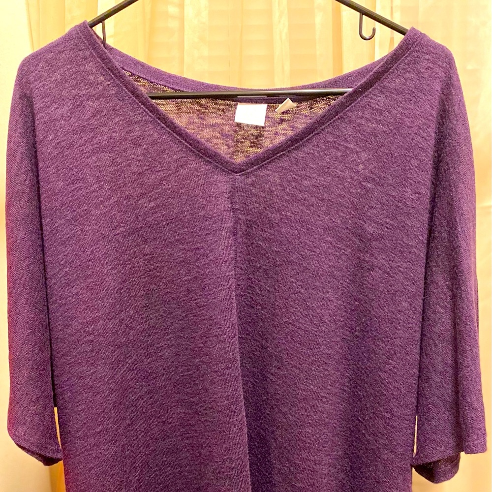 Purple quarter sleeved NY & Company sweater.
